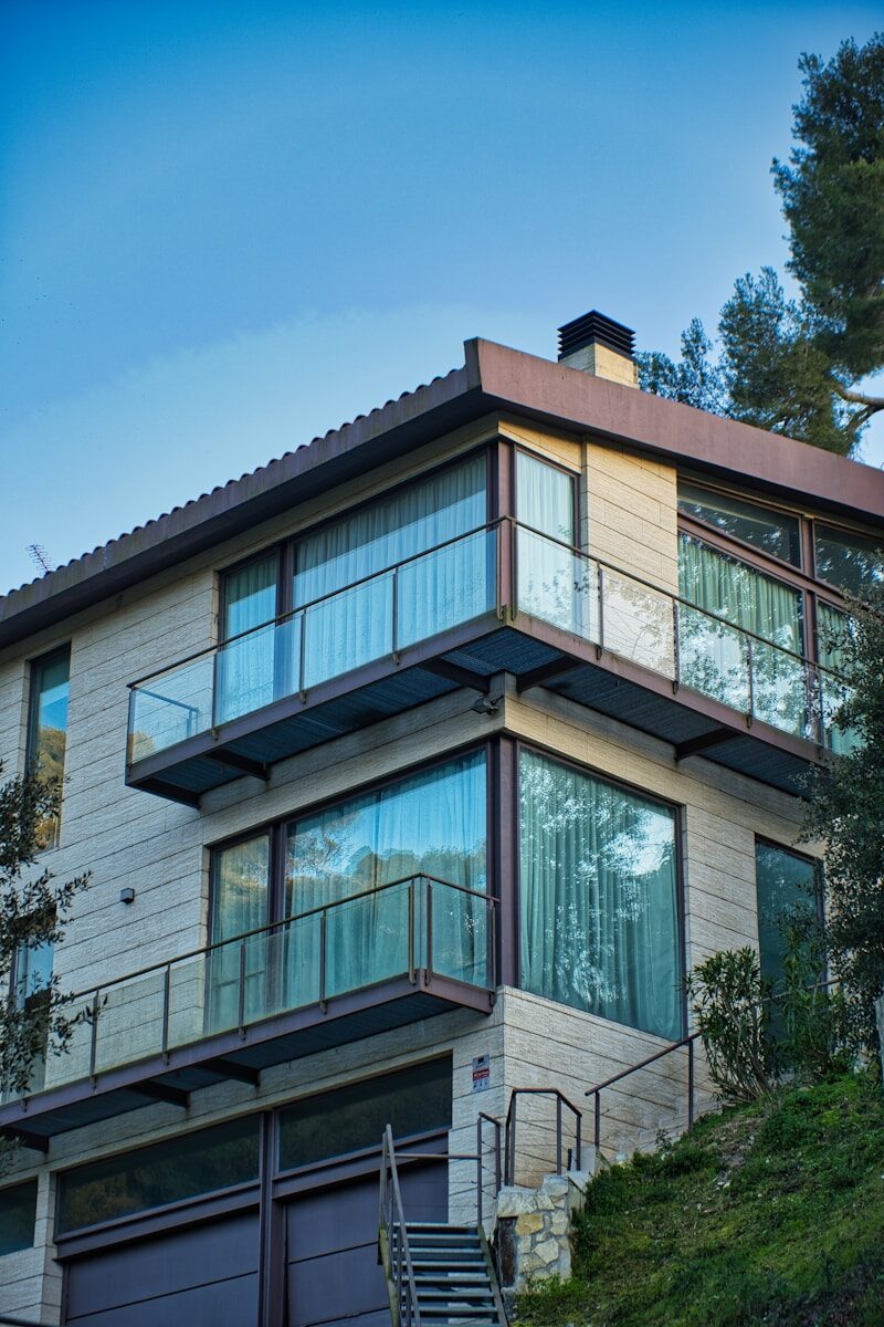a house on a hill with a staircase going up to it